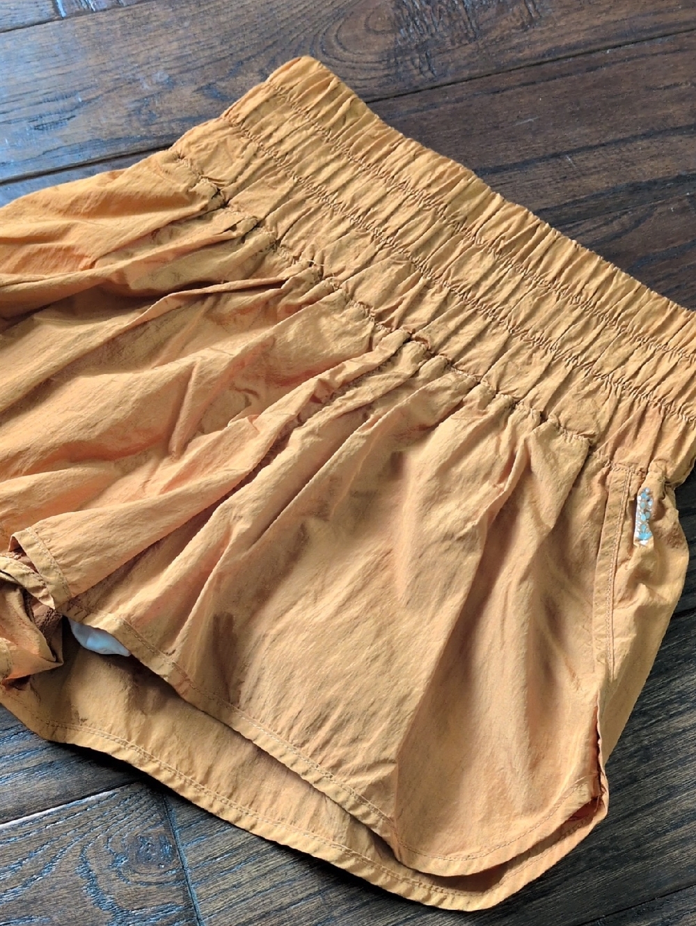 FP Movement by FREE PEOPLE I The Way Home Athletic Shorts in Coconut Orange, L